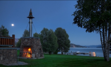 Exterior fireplace with Lake Pend Oreille